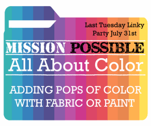 A colorful event ticket or label featuring a rainbow design with the text "mission possible: all about color - last tuesday linky party july 31st", suggesting a creative gathering focused on using color in fabric or paint.