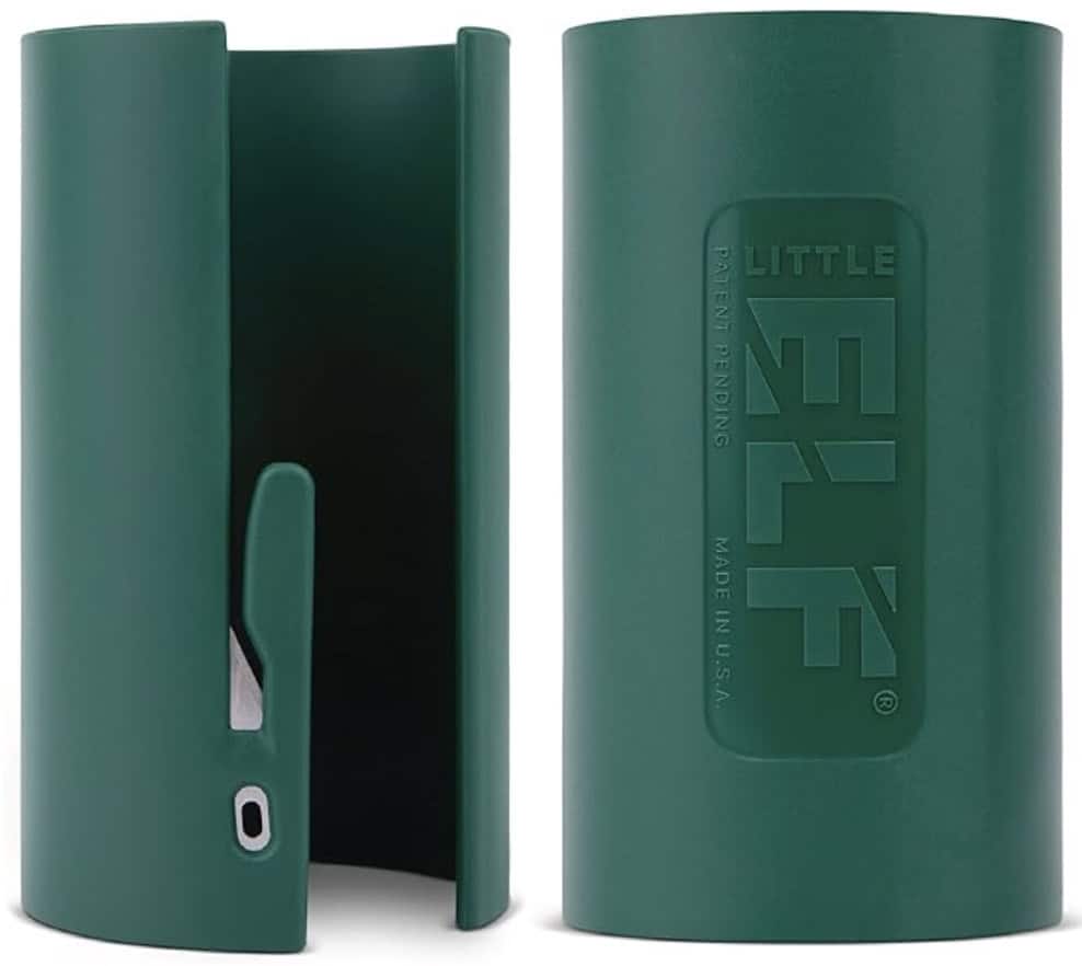 Two green cylindrical plastic devices with a slit, one showing a small metal blade inside; the other side displays the embossed logo "LITTLE ELF." These are tools for cutting wrapping paper.
